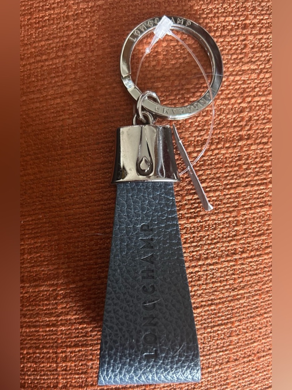Longchamp Pebbled Leather Keyring with Silver Hardware. NWOT